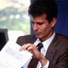 photo of man reading document